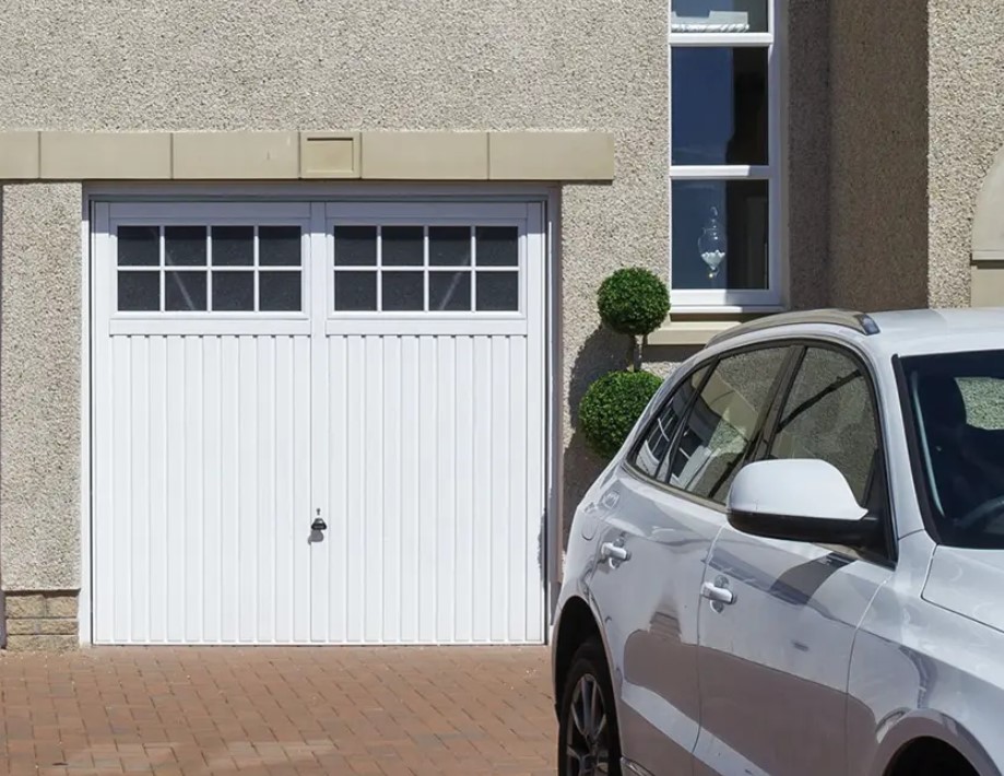 Should I repair or replace my garage door? - TAC Overhead Door Houston